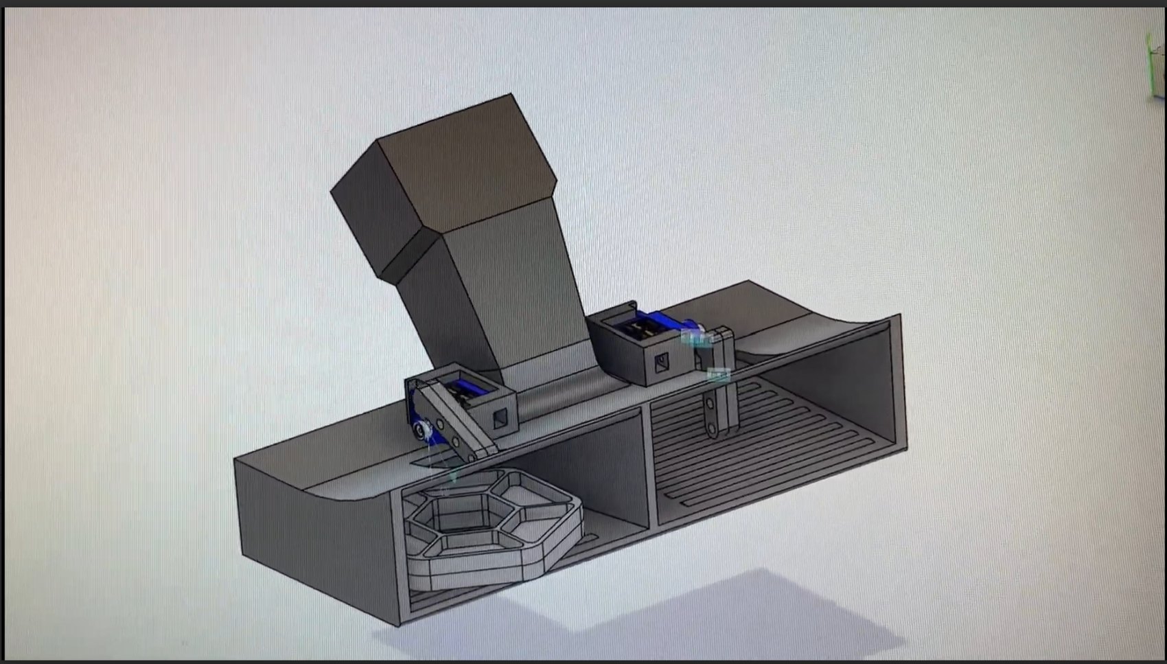 Ramp and bucket assembly with the servo-driven locking mechanism.